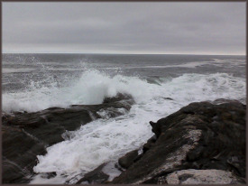 waves crashing on a rocky coast