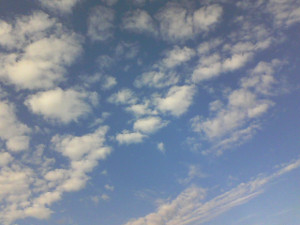 blue sky with a few wispy clouds